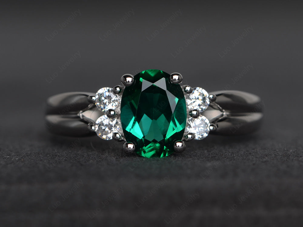 Dark green store emerald engagement rings