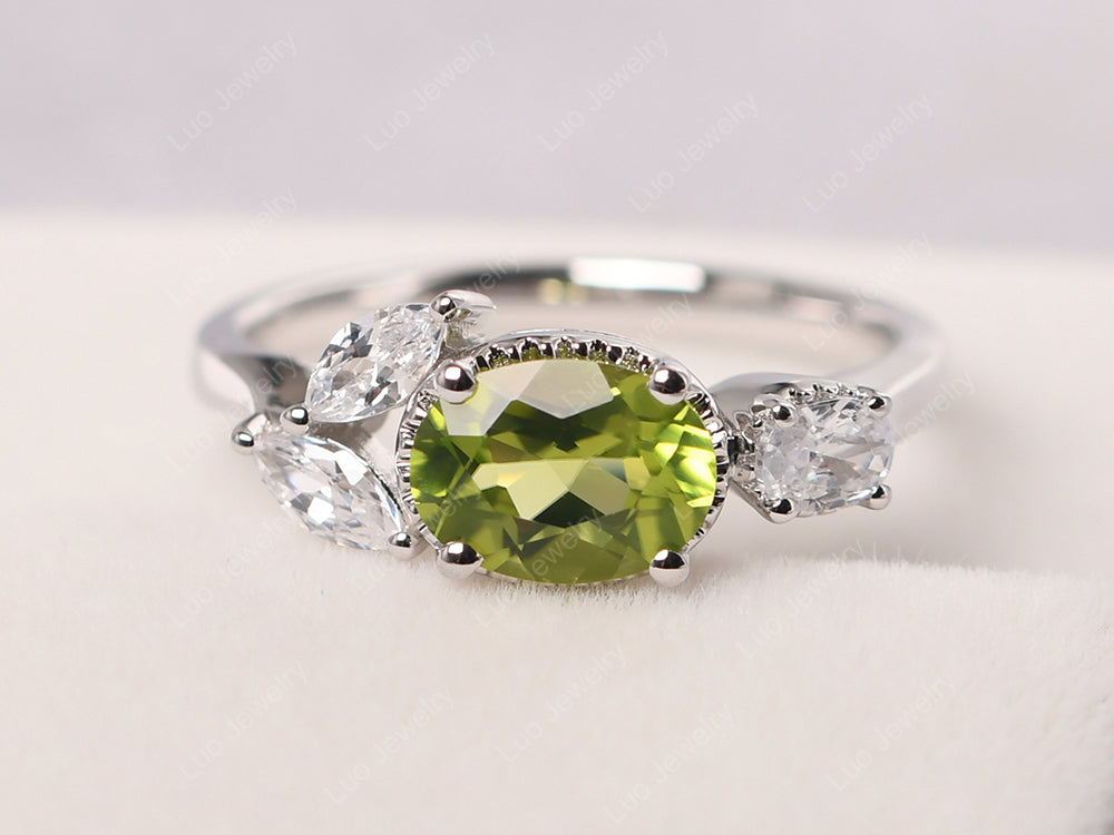 Emerald and store peridot mothers ring