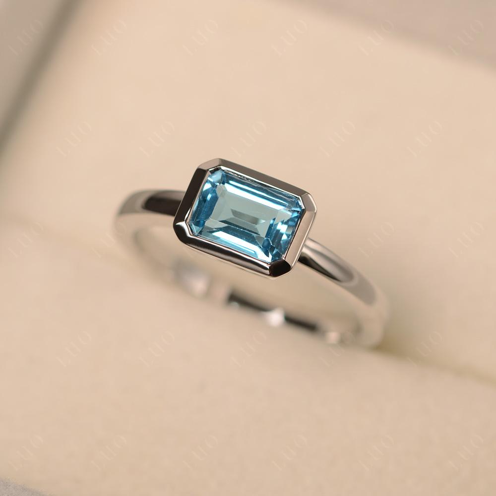 East West Emerald Cut Swiss Blue Topaz Bezel Ring - LUO Jewelry 