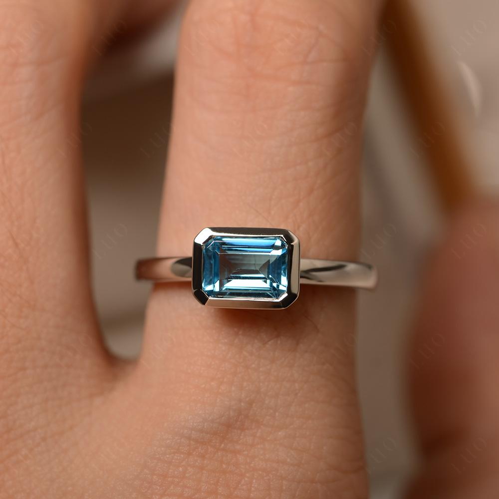 East West Emerald Cut Swiss Blue Topaz Bezel Ring - LUO Jewelry 