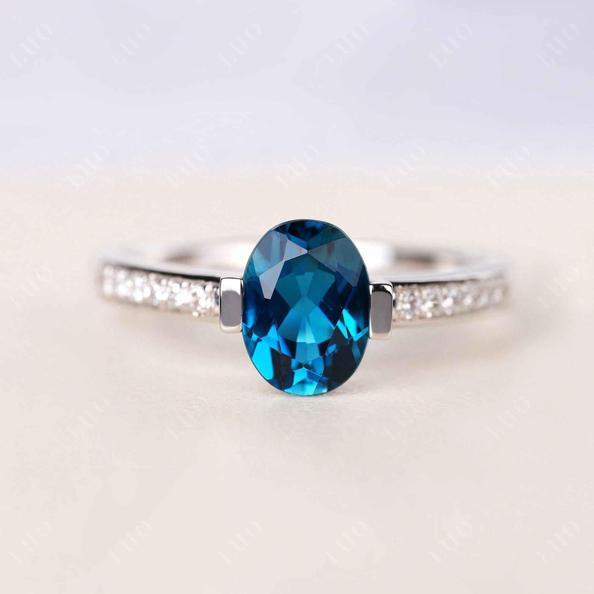 Oval London Blue Topaz Engagement Ring Half Bezel Set | LUO Jewelry