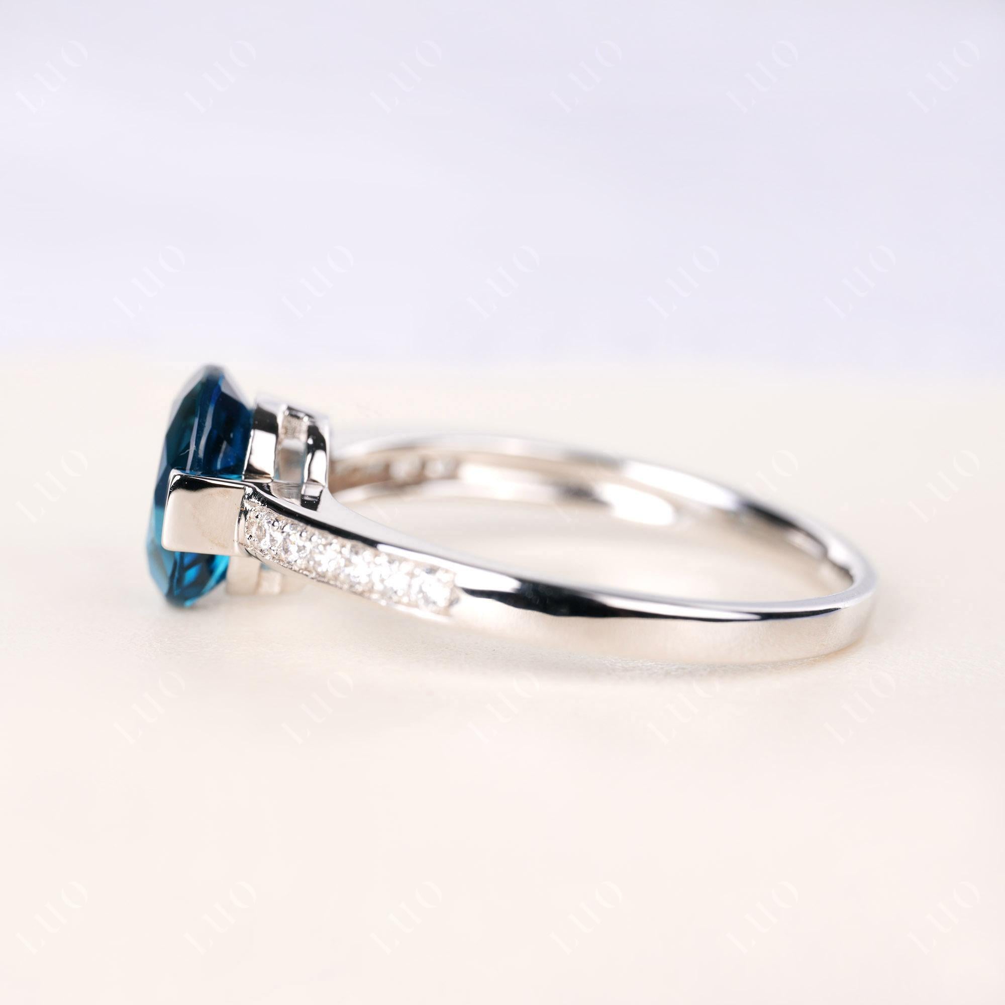 Oval London Blue Topaz Engagement Ring Half Bezel Set | LUO Jewelry