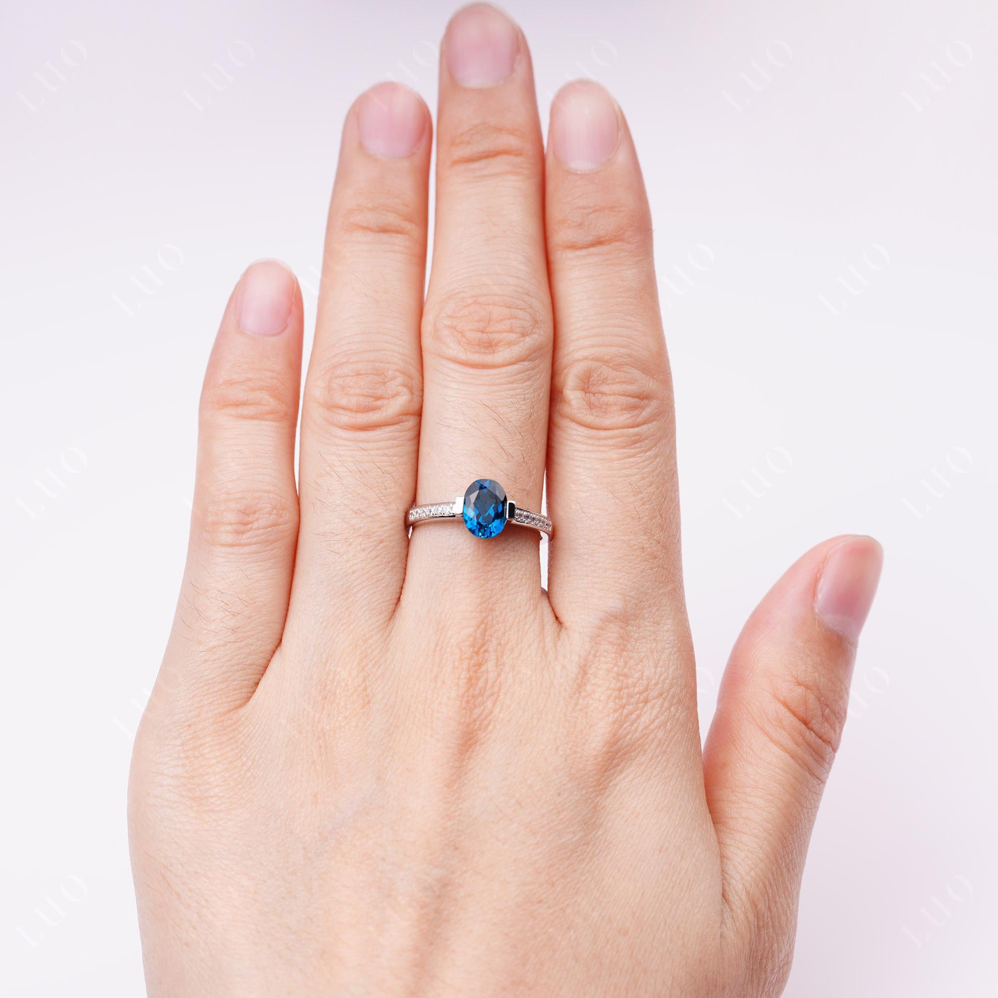 Oval London Blue Topaz Engagement Ring Half Bezel Set | LUO Jewelry