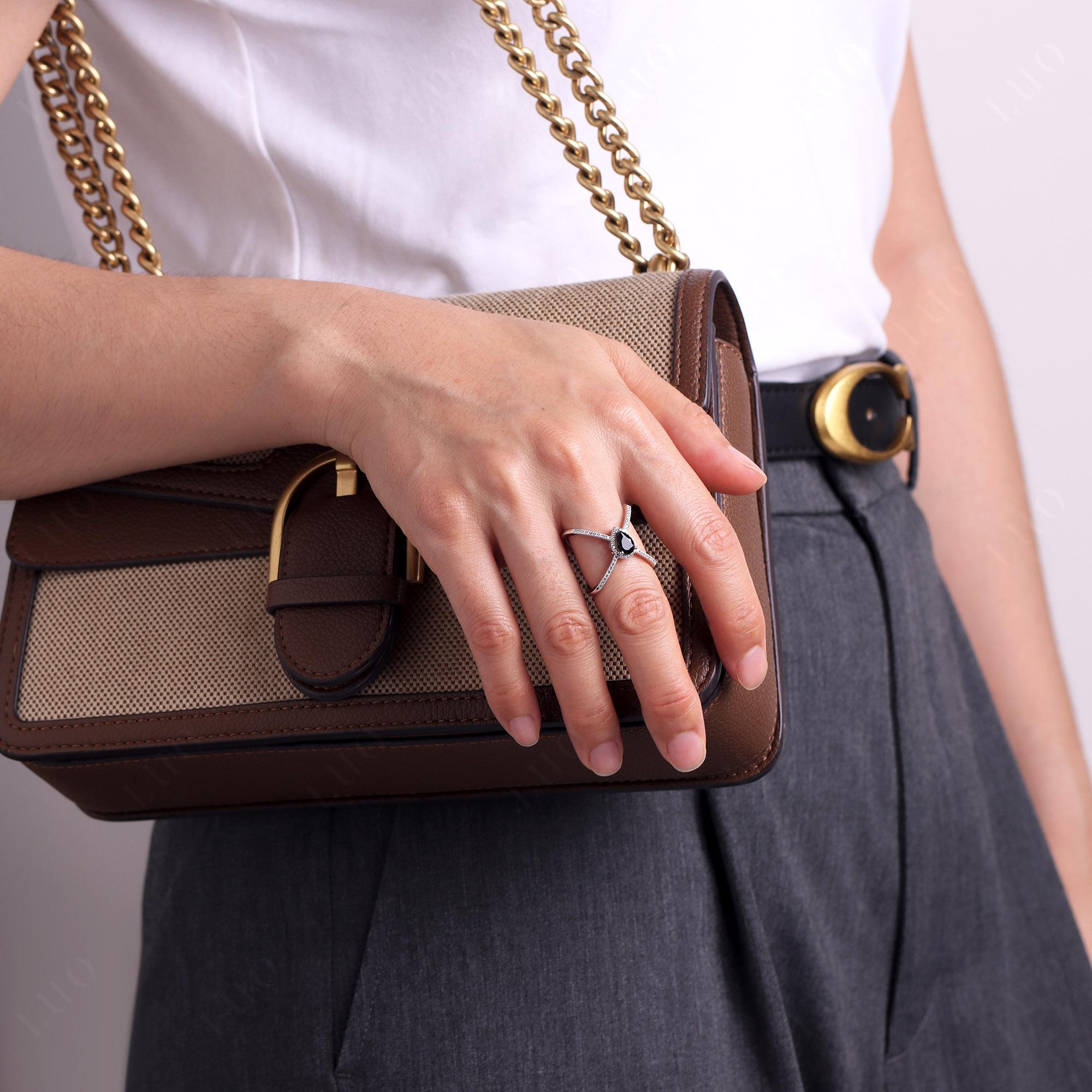 Pear Shaped Black Spinel Criss Cross Ring