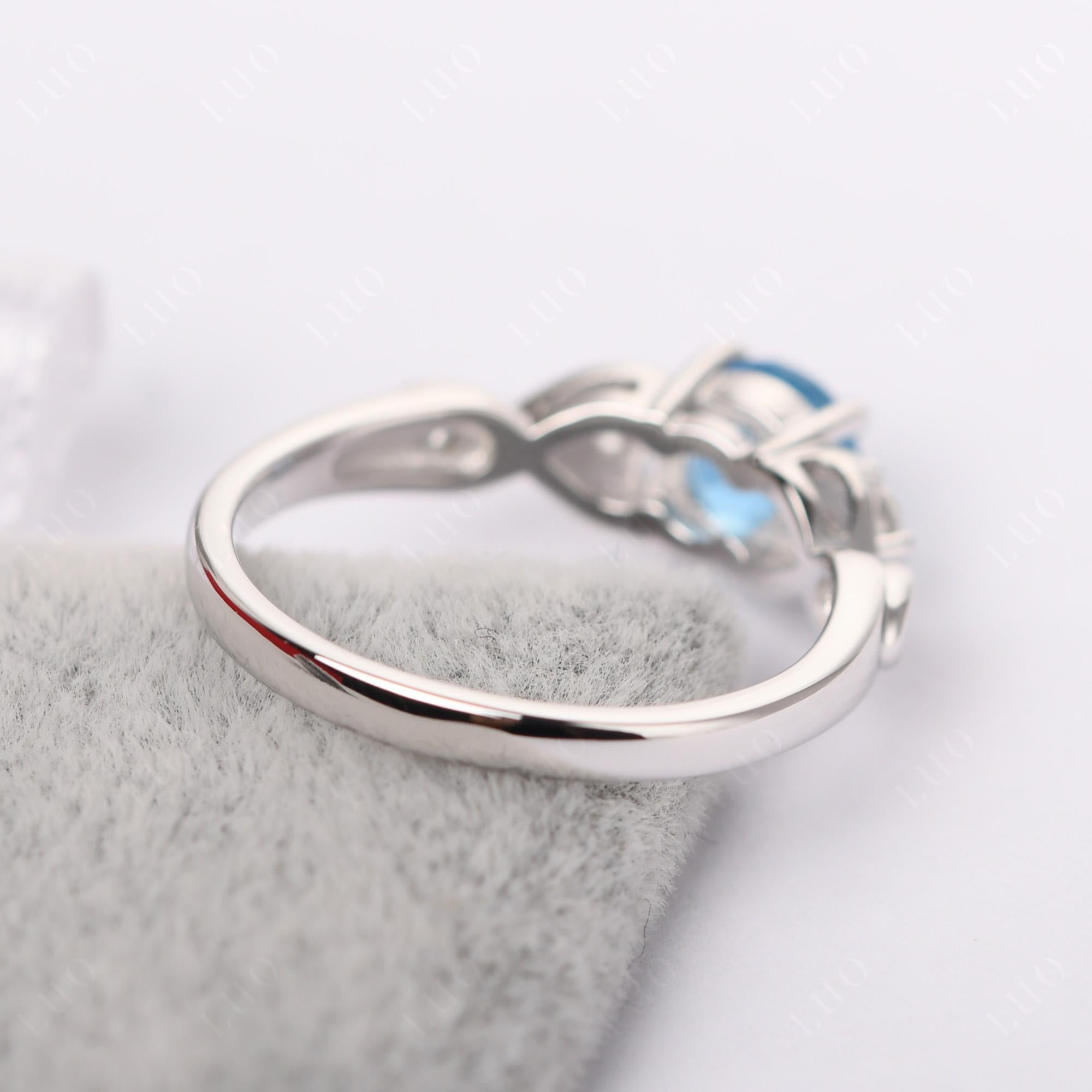 Swiss Blue Topaz Twisted Ring - LUO Jewelry 