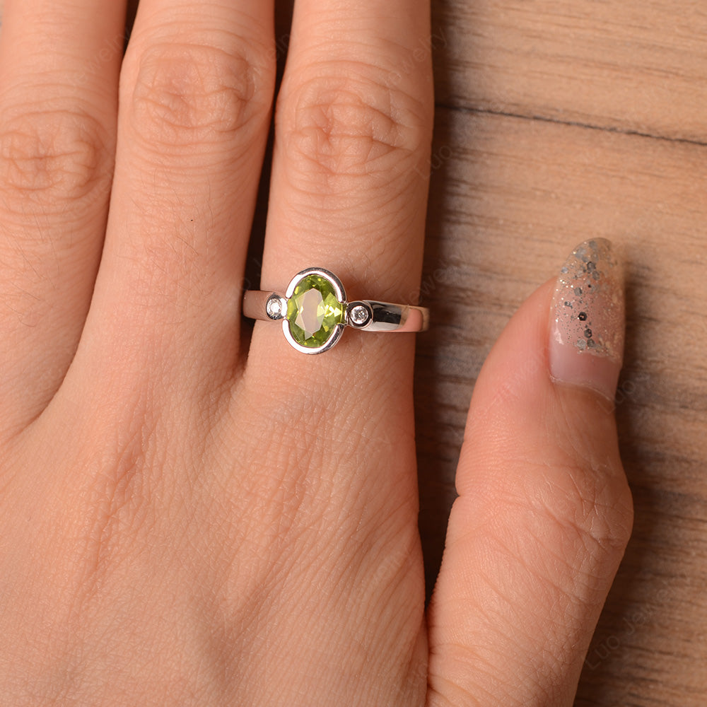 Bezel set hot sale peridot ring