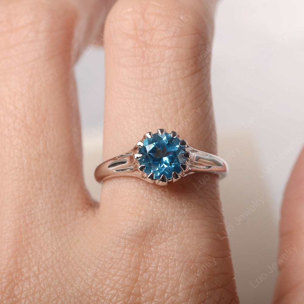 Blue topaz solitaire engagement on sale ring